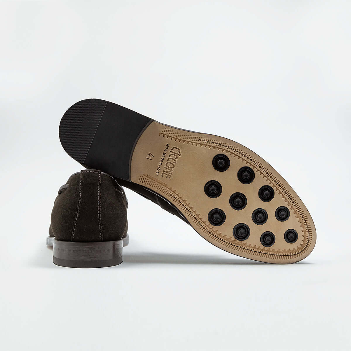 leather sole of Loafer men's shoes Ortigia by Ciccone with tassels in dark brown suede