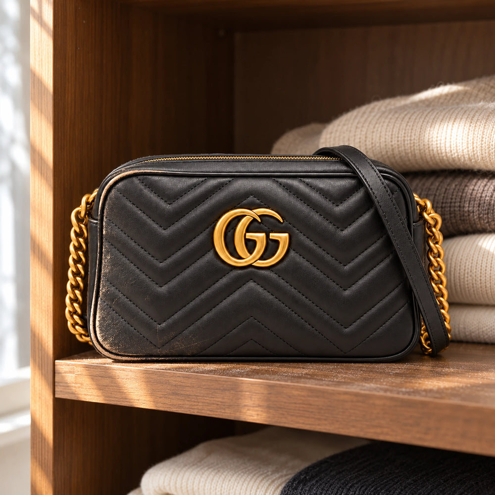 Gucci Marmont usurata in un contesto reale, prima della riparazione